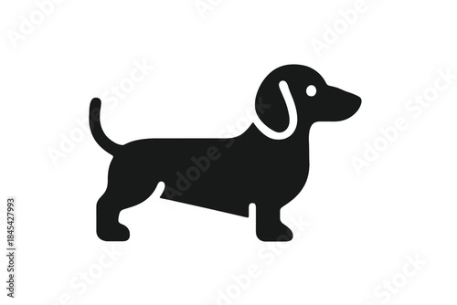 Minimalist black silhouette of a standing Dachshund dog in profile view on white