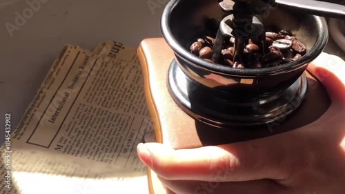 Grind coffee beans by hand 