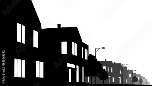 Row of silhouetted houses on a street with streetlights.