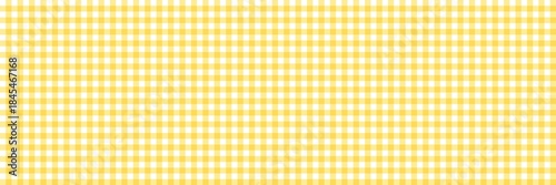 Yellow gingham checkered pattern background. Seamless pastel yellow plaid design. Soft and sweet vintage aesthetic. Yellow white gingham check tablecloth picnic style traditional.	