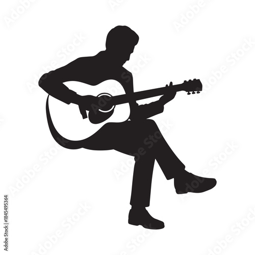 Silhouette of a musician passionately playing an acoustic guitar in a seated position