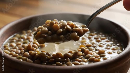 Lentil Soup Stirred with Spoon - A Hearty and Healthy Meal.