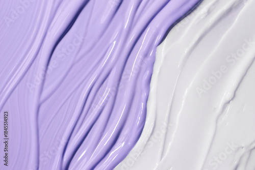 Bild auf Leinwand Abstract closeup of purple and white cosmetic cream texture strokes on a light background