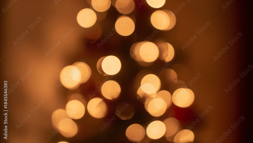 Obraz premium Glowing golden string lights forming triangular bokeh shape in home, suggesting conifer