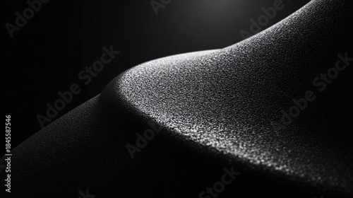 A textured skin under soft, directional lighting creates sensual and suggestive contours