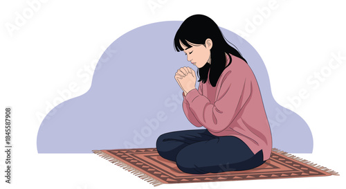 A serene young woman kneels on a decorative rug with her hands clasped and eyes closed, deeply engaged in prayer or hopeful meditation.
