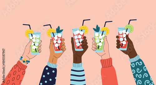 A group of diverse friends makes a toast, raising their colorful cocktail glasses together in celebration of friendship and good times.
