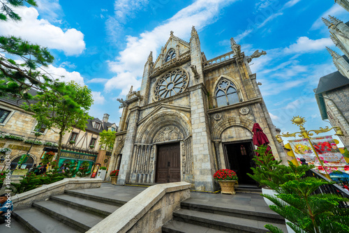 Catholic church on the square in the French village in Ba Na Hills Park, Danang, Vietnam.
