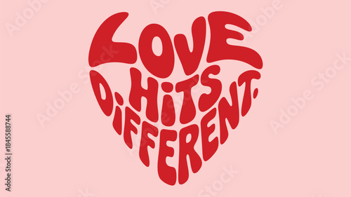 Warm pastel pink background with love hits different red heart text