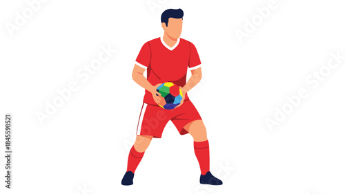 A confident male football player viewed from the front, wearing a red jersey and shorts, holding a vibrant, colorful soccer ball, ready for the match.