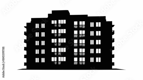 Silhouette of a Modern Apartment Building with Many Windows.