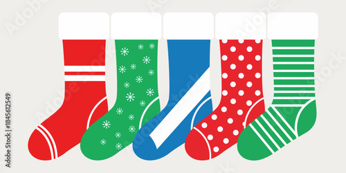 Festive Socks Display A vibrant assortment of decorative socks, each bearing unique patterns, stands side by side, showcasing holiday cheer.