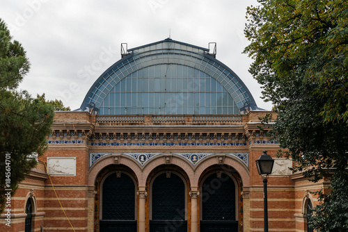 Palacio de Velazquez exhibition hall architecture in Retiro Park, Madrid