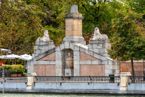 Retiro Park Sphinx fountain monument in Madrid during autumn