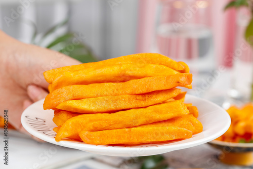 Crispy Roasted Groundnut Snack Bars in Hand - Healthy Fried Food