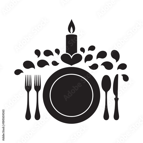 Elegant dinner setting with a candle plate and cutlery in black and white