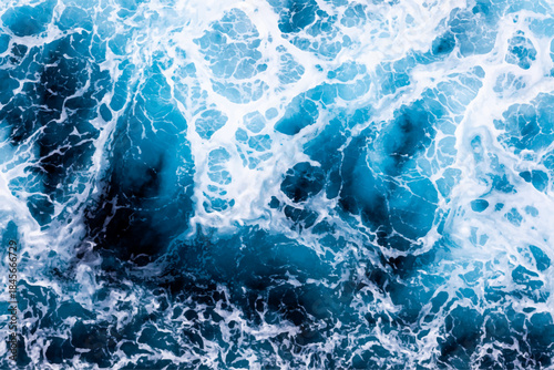 Sea water surface texture. Aerial view of breathtaking water with foam. Can be used in covers, packaging, posters, textures, banners, art and design projects. Picturesque vector illustration.
