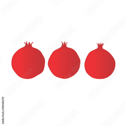 three red pomegranates