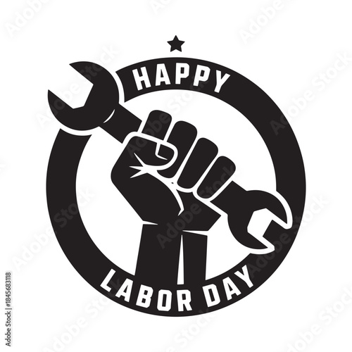 A clenched fist holding a wrench within a circular labor day badge