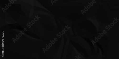 Crumple crushed black paper obsolete rumple craft design. wrinkle ripped creased crumple aged closeup recycled document grunge paper background.
