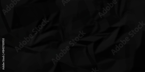 Crumple crushed black paper obsolete rumple craft design. wrinkle ripped creased crumple aged closeup recycled document grunge paper background.