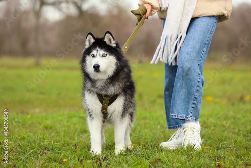Young woman walking with cu...