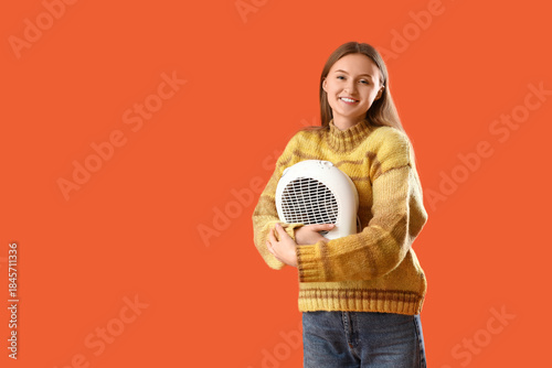 Young woman in sweater with...
