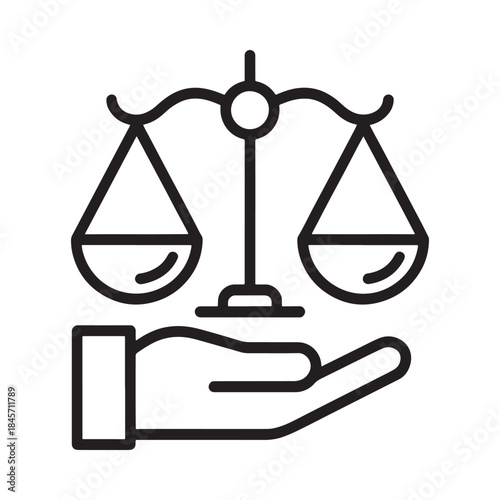 Scales of justice held by a hand representing law and fairness
