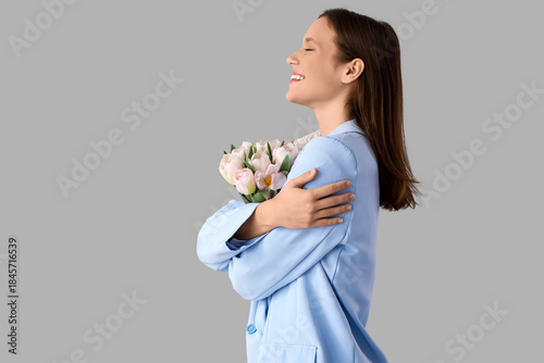 Young businesswoman with tu...