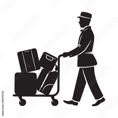 A silhouetted bellhop carrying stacked luggage on a wheeled cart