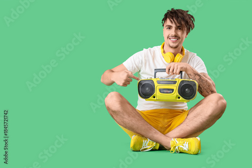 Young man pointing at boomb...