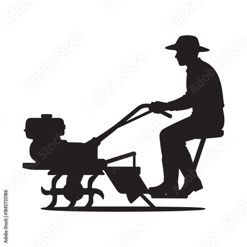 Silhouette of farmer operating a tiller machine agriculture