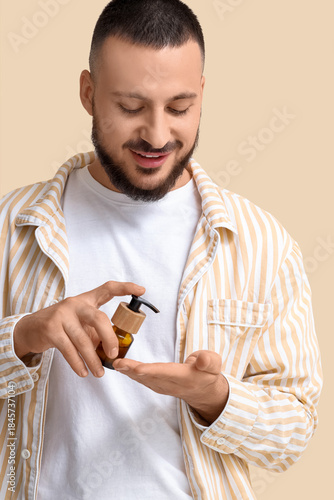 Handsome young man applying...