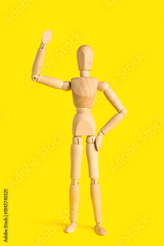 Wooden mannequin with raise...