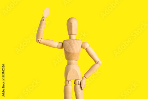 Wooden mannequin with raise...