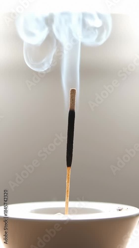 Incense Stick Burning With Rising Smoke in Slow Motion