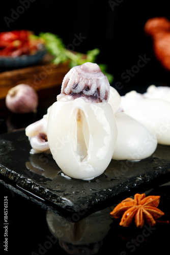 Foto Fresh Frozen Baby Cuttlefish and Skinless Squid - Premium Aquatic Product