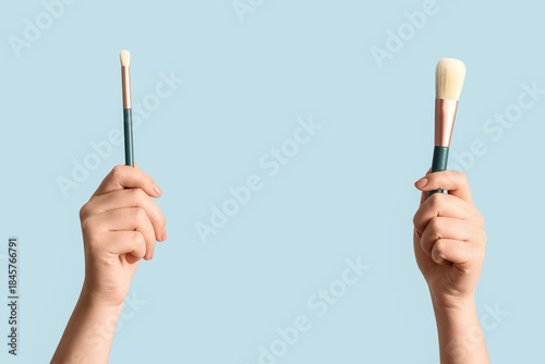 Female hands with makeup br...