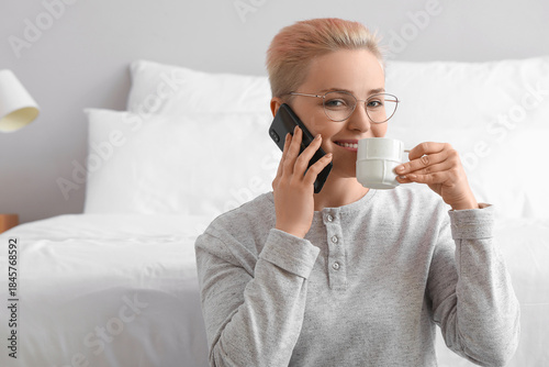 Young woman with cup of cof...
