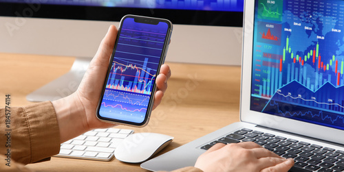 Female trader working with ...