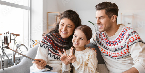 Happy parents with little d...