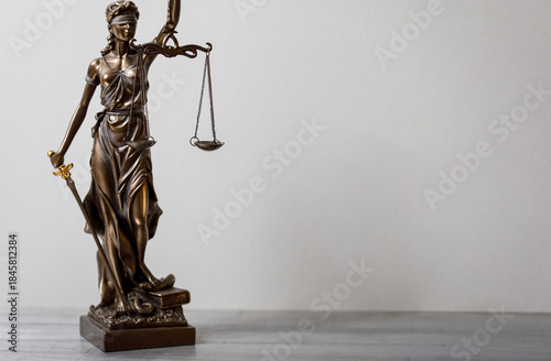 A bronze statue of Lady Jus...