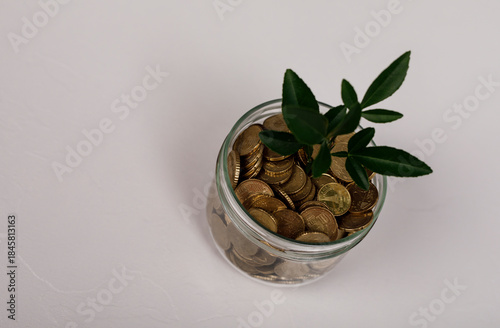 A glass jar filled with coi...