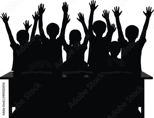 Silhouette of Children with Hands Raised Sitting at Desks in a Classroom kids students