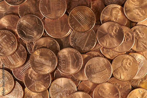 Close up of a collection of pennies. Seven times actual size. Copper pennies.


