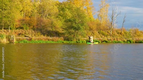 Wallpaper Mural a kayak on a river on a sunny autumn day Torontodigital.ca