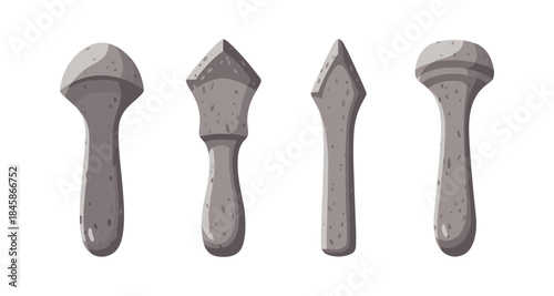 Collection of four ancient stone tools with different shapes and textures