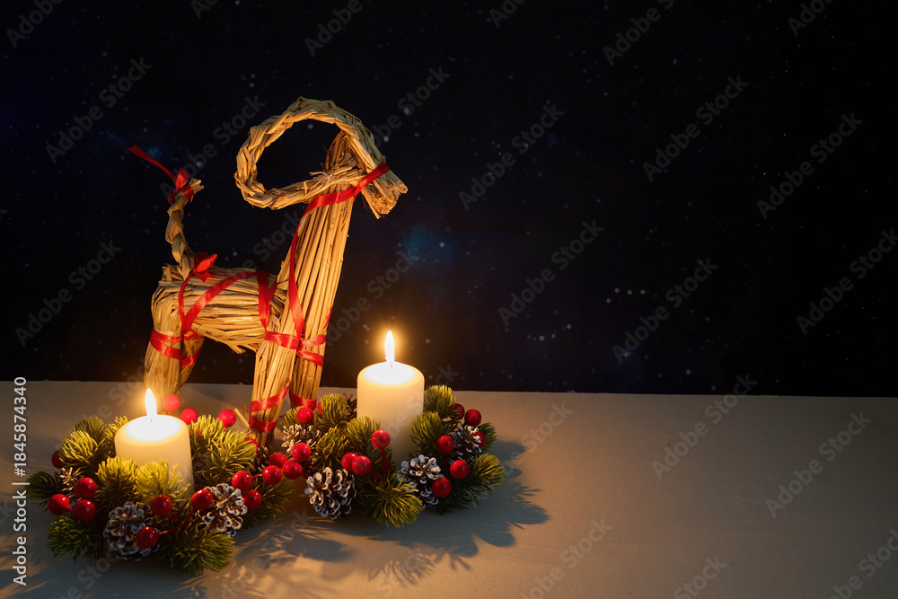 Fototapeta premium Julbock Christmas Straw Goat and Candles