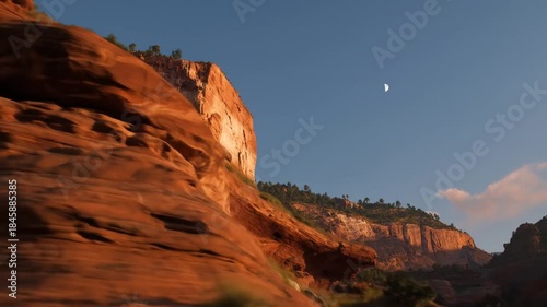 Dramatic landscape of sandstone cliffs under a clear blue sky