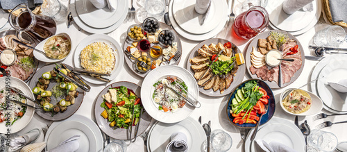Festive banquet table with assorted traditional dishes
